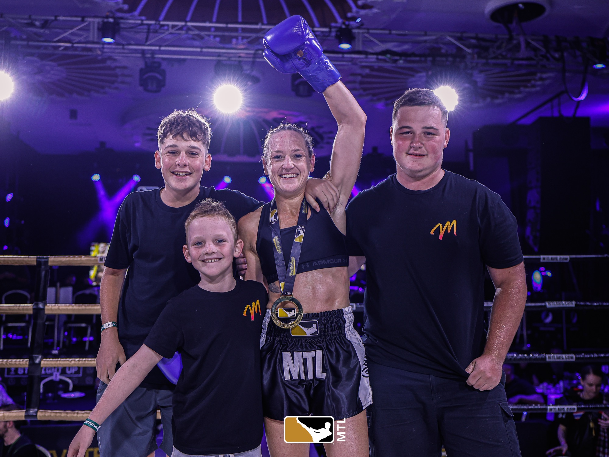 Mardi Davies celebrating a win with her three sons